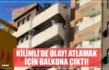 Atlamak için balkona çıktı!