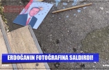 ERDOĞANIN FOTOĞRAFINA SALDIRDI!