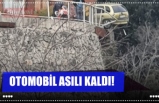 OTOMOBİL ASILI KALDI!