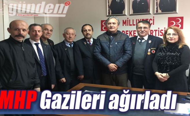 MHP Gazileri ağırladı